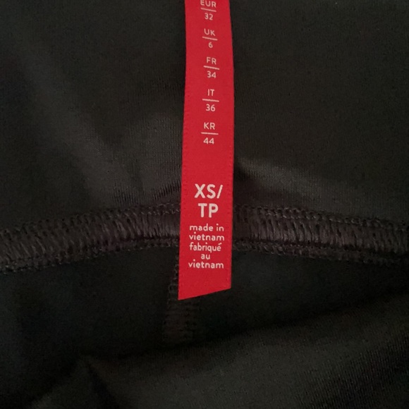 Only worn ONCE. XS Spanx black camo leggings. - Picture 3 of 4